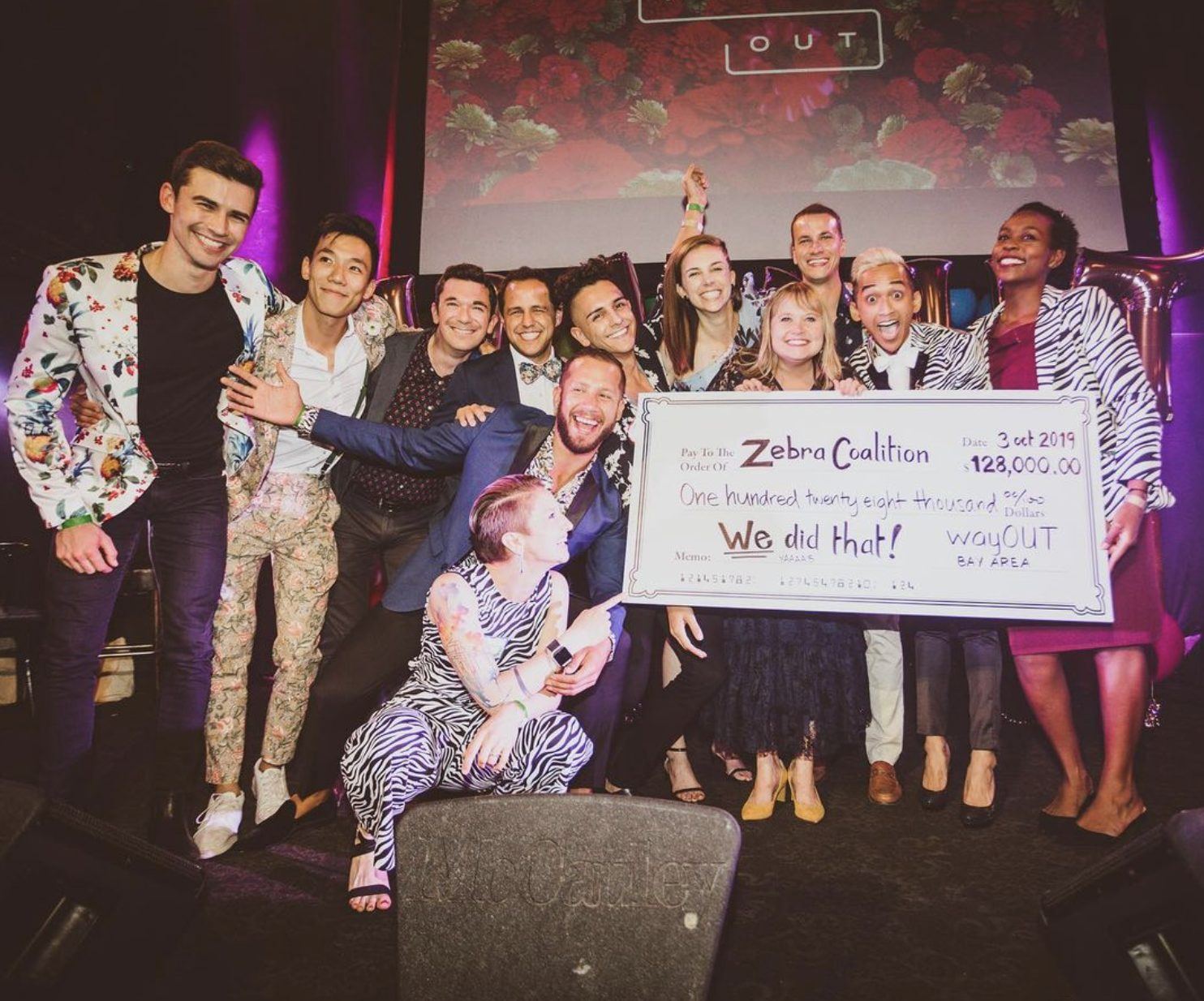 The Bay Area crew holds up the Zebra Coalition check, We did that